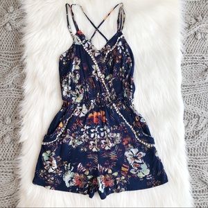 Floral criss cross strap romper
